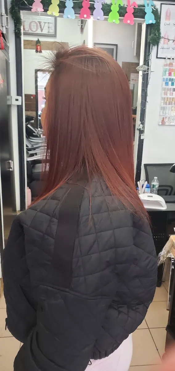 Elegant Unisex, beauty salon at 2-99 Saint Nicholas Avenue in Queens, New York
