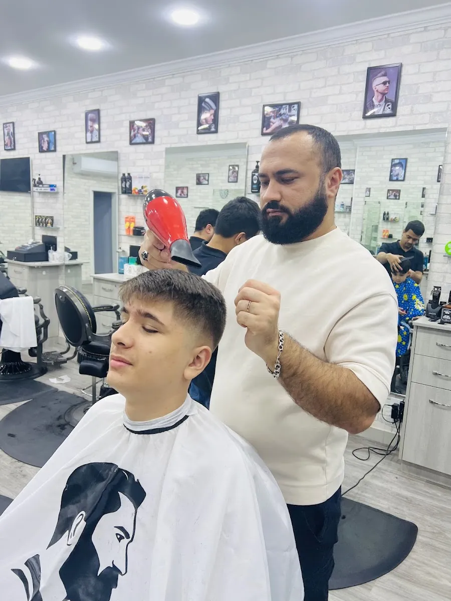 Sam City Barber Shop, hair salon at 6811 Bay Parkway in Brooklyn, New York